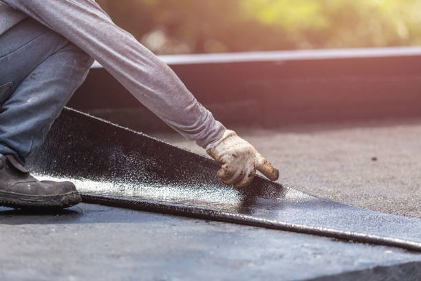 Professional Waterproofing technician working in Brownsville, OR